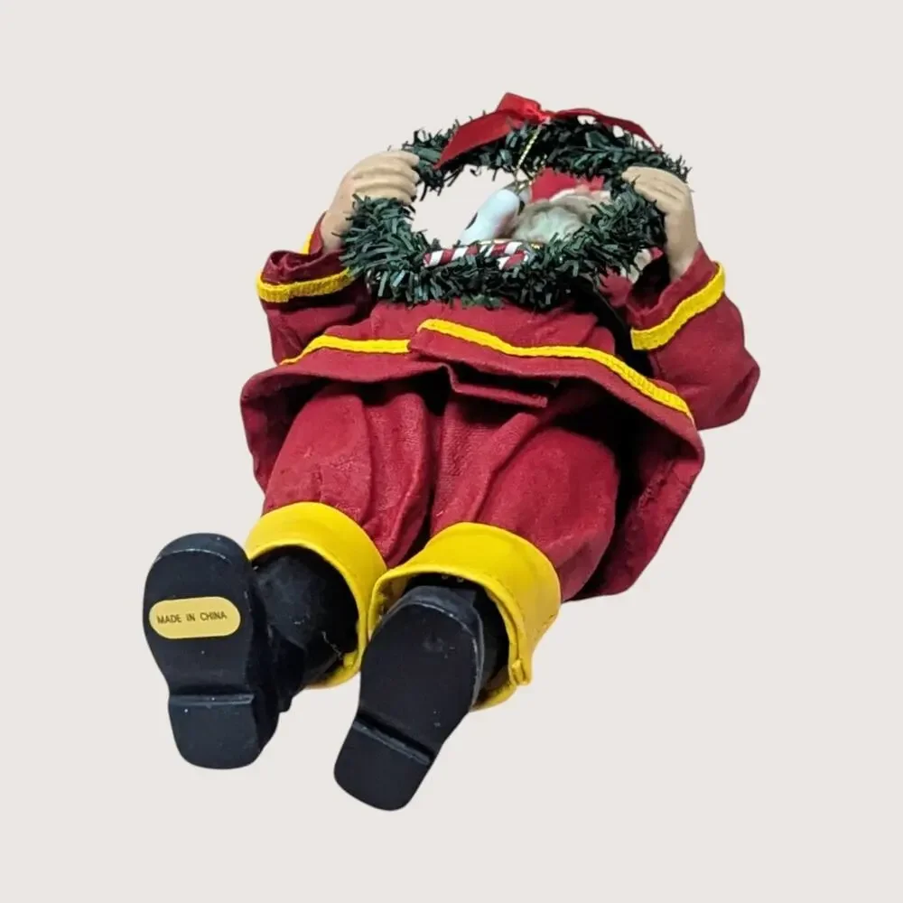 Vintage Fabriché Fireman Santa Holding Wreath Figurine
